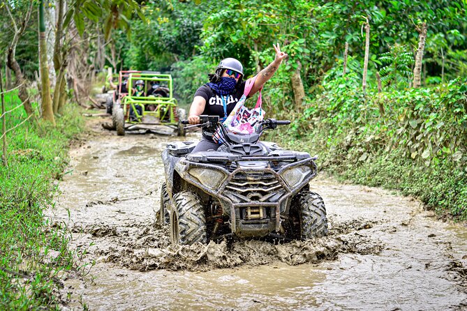 ATV or Buggy ride in Punta Cana - Stop 4: Cueva Padre Nuestro — Taíno Pictographs and a Swim-Ready Cave