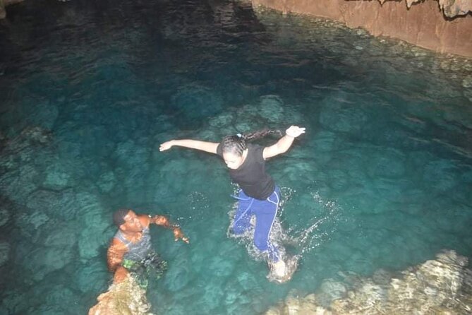 Buggy Tour around Macao Beach and Taino Cave with Transportation - Taino Cave: the underground river swim (with a near-3-meter jump)