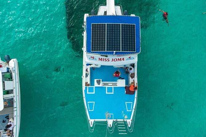 Experience for families and friends by private boat with pick-up - Stop 1: Bavaro Beach snorkeling with expert help