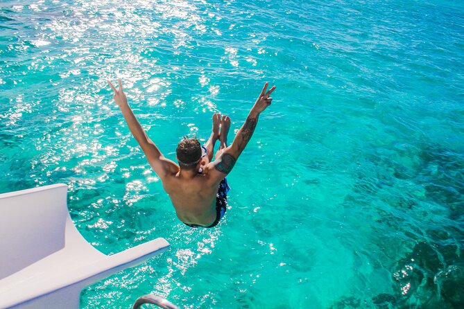 Float & Feast Private Party Cruise with Premium Buffet & Open Bar - The onboard party: slide, Dominican dancers, and Claudia energy