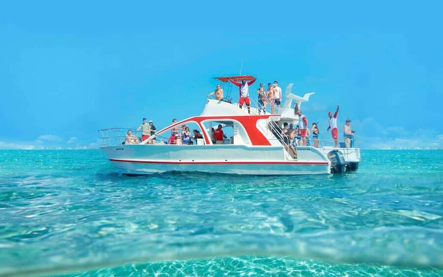From Bavaro, Punta Cana: Boat Party, Snorkeling, Drinks, Snacks, and Transportation - The In-Between Stretch: Music, Drinks, and Snacking While You Cruise