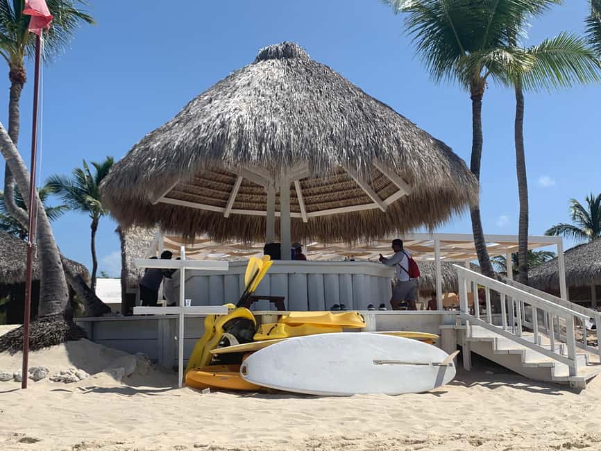 From Punta Cana: Catalina Island Swim, Sail & Snorkel - Catalina Island beach time: loungers, food, and where the beach gets busier