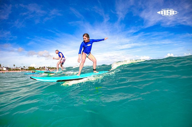 Group Surf Lessons Punta Cana – Fun, Easy & Beginner-Friendly - Mid-lesson break: coconut water, fruit, and a real reset