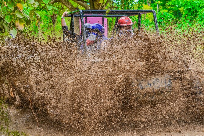 Half-Day Buggy Tour to Water cenote and Macao Beach in Punta Cana - Macao Beach After the Mud: Limestone Cliffs and Laid-Back Waves