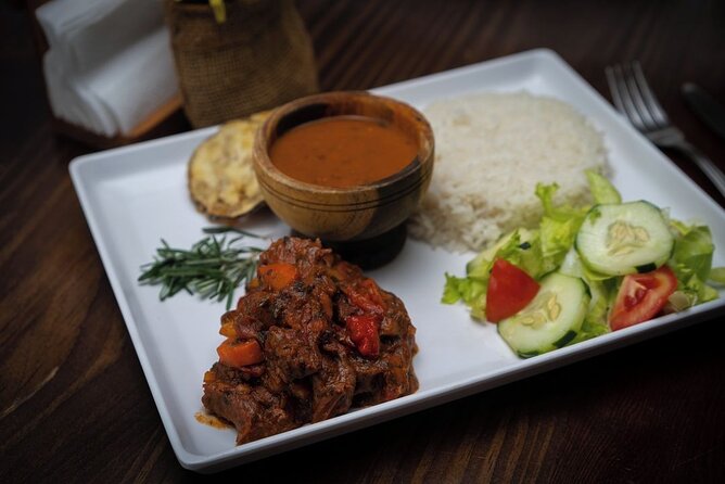Half Day Punta Cana Food Tour Including Transportation - Stop 2 in Punta Cana: Mains with the Comfort-Food Muscle