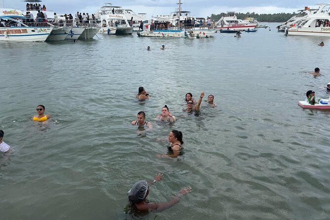 Half-Day Tour with Punta Cana Beach Boat Party - Stop 2: Punta Cana Natural Pool Snorkeling and Starfish Photos