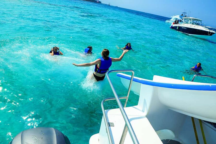 Party Boat and Snorkelling in Punta Cana - Dolphins by boat: seeing man-made Dolphin Island from the water