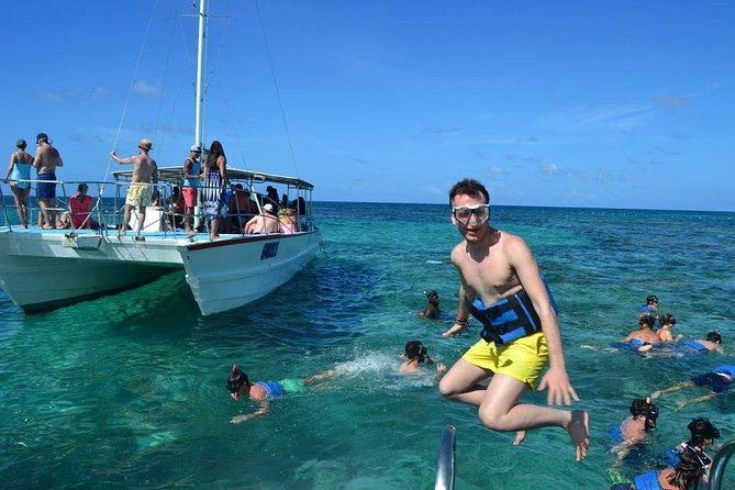 Party boat in Catamaran with Open Bar Only Adults + Snorkeling - A Three-Hour Catamaran Party Off Punta Cana’s Bávaro Coast