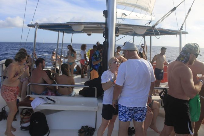 Party boat in Catamaran with Open Bar Only Adults + Snorkeling - Small Moments on the Water: Weather, Dolphins, and Memories
