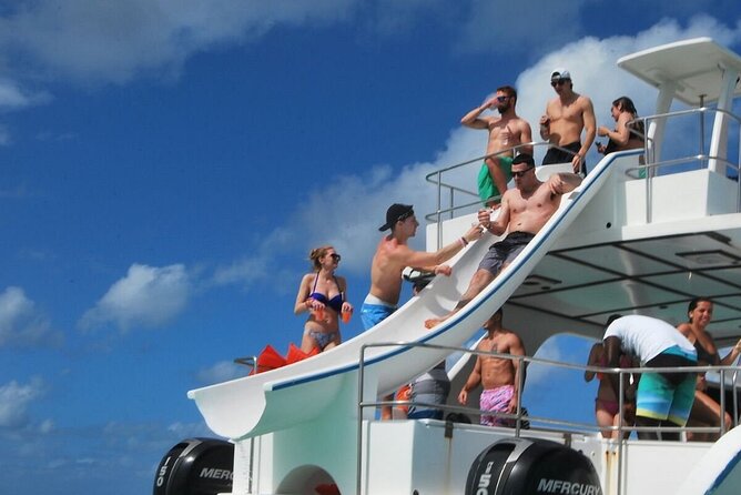 Party Boat /View Dolphins / Snorkling /Free Drinks and Transportation - What you actually do: dolphins, a snorkeling stop, and water slides