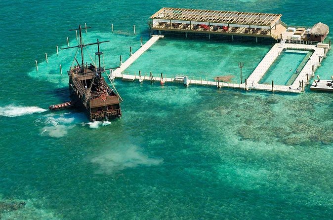 Pirates of the Caribbean Cruise- Snorkel, Sharks & Stingrays - Shark Island treasure hunt: pirate chaos, then water time