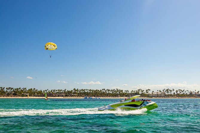 Private Catamaran + Private Parasailing - up to 20 passengers - Onboard welcome: drinks, music, and getting fitted