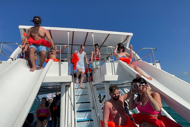 Private Luxury Double Slide Party Boat - Cruising Bavaro Beach: dolphins, cocktails, and the reef-adjacent swim