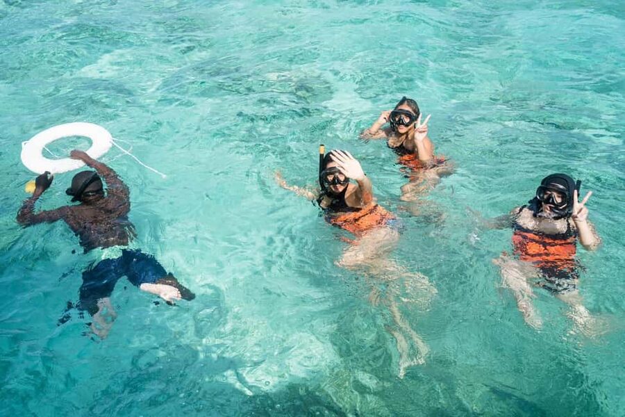 Punta Cana: Catamaran Tour with Reef Snorkeling and Open Bar - Hotel pickup to the dock: how the day starts in Punta Cana