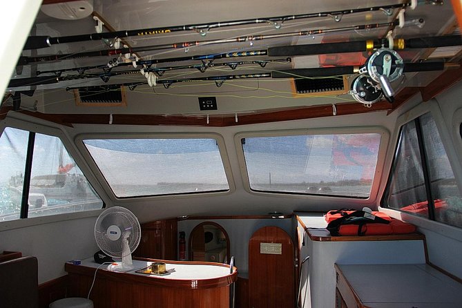 Punta Cana Private Fishing Charter on 39 Foot Boat with Bevarages - How the Captain and First Mate Help You Catch Fish