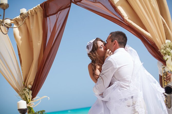Punta Cana wedding photographer, Wedding ceremony - Ceremony visuals: pastel decor, rose petals, and live orchestra