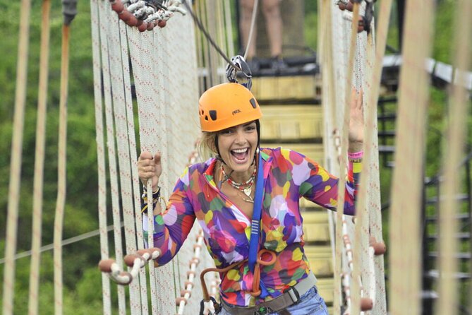 Punta Cana Ziplines, Hanging Bridge, and Waterfall Pool Adventure - The Splash Landing and Blue Lagoon Cenote Stop