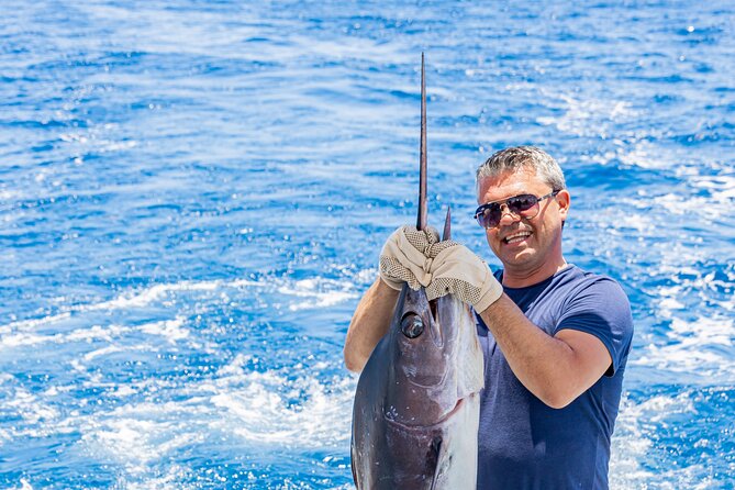 Reel Adventures: A Fin-tastic Fishing Tour - The Fishing Setup: Rods, Reels, Bait, and Tackle Provided
