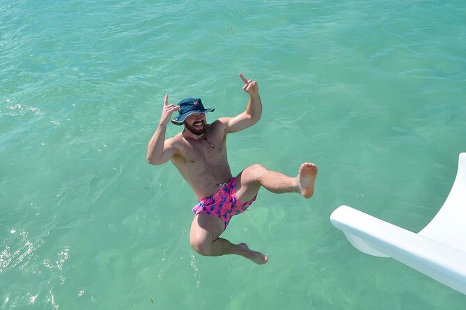 Sand-Bar Punta Cana Party Boat unlimited drinks, snorkeling Vibes - Dolphins, music, and the crew that keeps the day moving