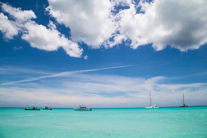 Saona Catamaran Cruise with Lunch and Natural Swimming Pool - Beach Time on Saona: Beautiful Water, Crowds, and Practical Complaints