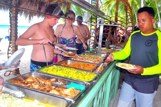 Saona Island Catamaran Cruise Experience (All Inclusive) - Saona Island beach club time: relaxation, swimming, and “extra cash”