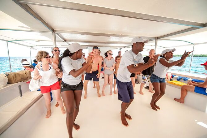Saona Island Day Trip From Punta Cana with Lunch and Open Bar - The return catamaran: dance party energy